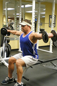 Seated lateral raise, end position